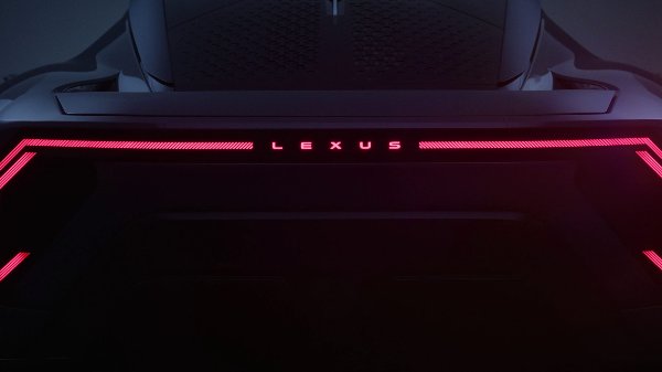 Rear view of a Lexus concept car with illuminated red taillights.