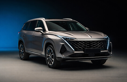 Silver SUV with modern design, front and side view.