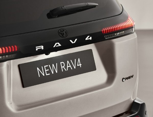 Close-up of the rear badge and lights on a new RAV4 car.