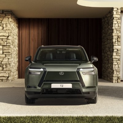 Front view of a green Lexus SUV with 'TZ' on the number plate.