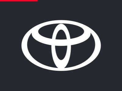Toyota logo in white on a dark background.